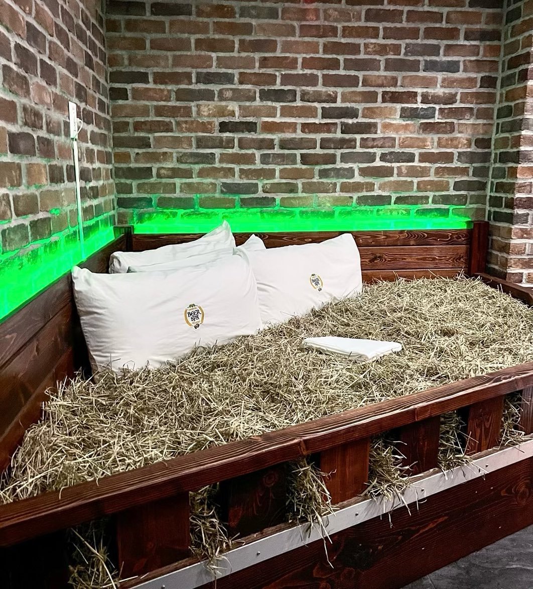 hay bed with white pillows